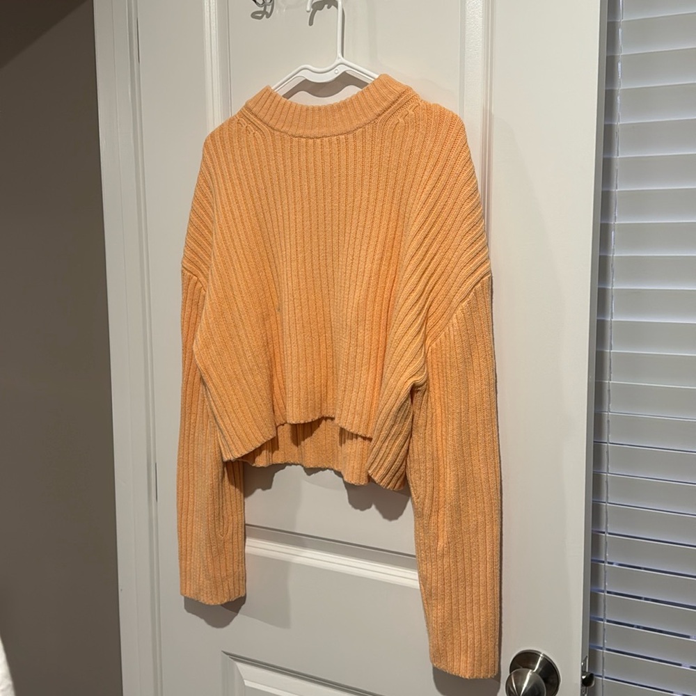 Orange H&M sweater (women’s medium)